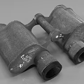 Vintage Binoculars With Textured Surface Metal Body And Adjustment Knob Design Details