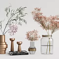 Golden And Glass Vases With Pink Flowers And Green Foliage For Home Decor