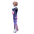 Woman in Purple Blue Kimono With Cherry Blossom Patterns And Pink Ribbon Tassels Standing Gracefully