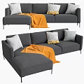 Modern Gray Sectional Sofa with White Patterned Pillows and Orange Throw on Black Metal Legs 3d model