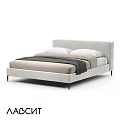 Modern Light Colored Double Bed With Upholstered Headboard And Black Legs