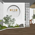 Indoor Landscape Featuring Green Plants Stones Circular Illuminated Sign White Walls Wooden Flooring Lattice Decor