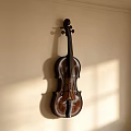 Vintage Wooden Violin Hanging On Wall With Sunlight Shadow Effect