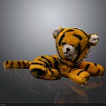 Orange Black Striped Tiger Plush Toy With White Ears Lying On Surface 3d model