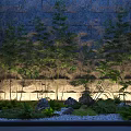 Garden Ornament Design With Stone Wall Bamboo Plants Illuminated Lanterns And Pebbles
