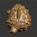 Golden Animal Sculpture With Bat Wings And Lion Like Features On Reflective Surface