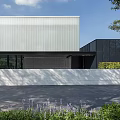 Contemporary Modern Building With Skylight Roof Glass Facade And Greenery