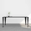 Black Dining Table With Slim Legs Green Plant Vase White Wall And Grey Floor Design