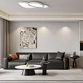 Modern Living Dining Room Interior With Black Sofa Round Coffee Table Artwork And Ceiling Light