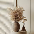 Dried Flowers Arrangement in Large Gray and Small Brown Vases by Window Blinds