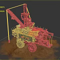 Mechanical Construction Vehicle With Red Blue Body And Crane Arm On Sandy Ground
