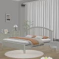 White Modern Double Bed With Bedding Pillows Nightstand Table Lamp And Green Plant In Bedroom