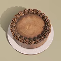 Round Brown Cake With Cream Decorative Border On White Plate 3d model