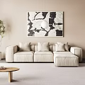 Cream Sectional Sofa With Cushions In Modern Living Room With Abstract Art And Potted Plant