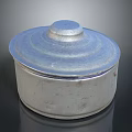 Artisan Handcrafted Metal Container With Sculpted Striped Lid And Layered Patterns