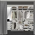 Organized Wardrobe Interior With Hanging Clothes Folded Items Storage Boxes And Drawers