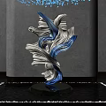 Blue And White Flowing Sculpture With Golden Base On Water Floor And Wall Background