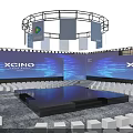 XCIND Modern Stage with Blue Lighting Illuminated Pillars and Audience Seats