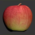 Fresh Red and Yellow Apple with Glossy Skin on Dark Background and Shiny Reflection