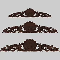 Artistic Dark Wood Carvings Showcasing Intricate Shell Shapes And Scrollwork Patterns