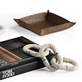 Decorative Ornament Set With White Candle Holders Brown Tray Black Books And Knotted Decor