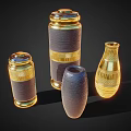 Decorative Ceramic Vessels With Gold Accents Textured Surfaces Lidded Tops And Various Shapes