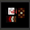 Assorted Colorful Chocolates With Heart And Square Shapes On Black Display Tray
