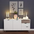 Modern Entryway Cabinet Sideboard With Decorations Candles Vase Green Plant And Wall Paintings