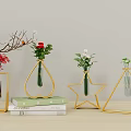 Geometric Golden Vases With Fresh Flowers And Green Leaves On Stacked Books