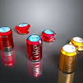 Red And Gold Coke Fanta Carbonated Beverage Cans On Reflective Surface