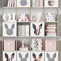 Modern Rabbit Ear Design Bookshelf With Pink White Storage Boxes And Gold Frame