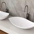 Two White Vessel Washbasins With Black Faucets On White Countertop And Marble Wall