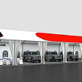 Industrial Factory Building With Red And White Roof And Parked Gray Vehicles