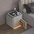 White Nightstand With Gold Accents Next To Beige Upholstered Headboard In Pink Striped Wall Bedroom