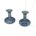 Pair of Blue and White Ceramic Candle Holders with Floral Vine Patterns