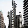 Modern Office Building with Glass Facade and Metal Structure in Urban Skyline