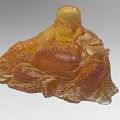 Decorative Ornament Set with Smiling Seated Maitreya Buddha in Golden Amber Glass Design