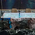 Unique Table and Chairs Set with Blue Ice-like Transparent Tabletop Lighting and Brown Leather Chairs
