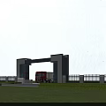 Modern Entrance Gate With Gray Pillars Blue Beam Red Truck White Fence And Green Lawn