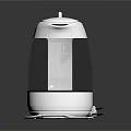 White Electric Kettle With Transparent Body And Power Cord On Black Base