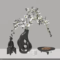 Black Irregular Shaped Vase with White Orchids and Decorative Items in Minimalist Modern Light Background