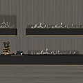 Modern Three Wall Mounted Fireplaces With Wooden Wall Background And Decorative Items On Base Platform