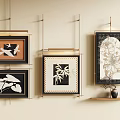 Abstract Paintings With Gold Frames On Beige Wall Featuring Bird Bamboo And Flower Patterns 3d model