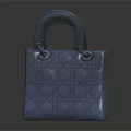 Blue Textured Leather Handbag With Circular Pattern And Handheld Handle Design
