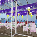 Mall Store Outdoor Dining Space with Hanging Green Vines White Furniture and Wooden Flooring