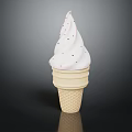 Creamy White Ice Cream In Waffle Cone Topped With Red Sprinkles On Dark Background