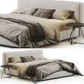 Cozy Bedroom Interior With Neutral Tones Bed Pillows Blanket And Black Side Table
