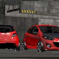 Red Mazda Hatchback Cars at Underground Garage Entrance with Concrete Structure and Yellow Warning Stripes