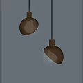 Glowing Modern Pendant Lights With Metallic Base And Transparent Globe Shade On Grey Wall