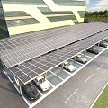 Solar Powered Carport With Charging Stations For Electric Vehicles By Modern Building